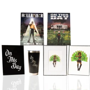 A collection of 'On This Day' memorabilia including books, a mug, and framed flower art.