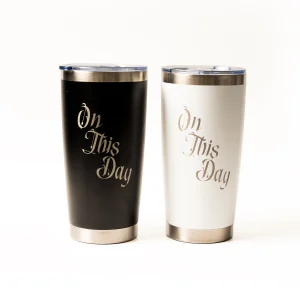 Two travel mugs, one black and one white, with 'On This Day' text.