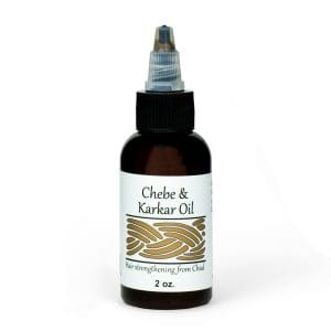 A small bottle of Chebe & Marlar oil with a dropper cap.