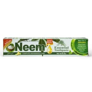 Neem herbal toothpaste in green and white packaging.